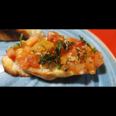 Entrada 4 bruschette Caprese