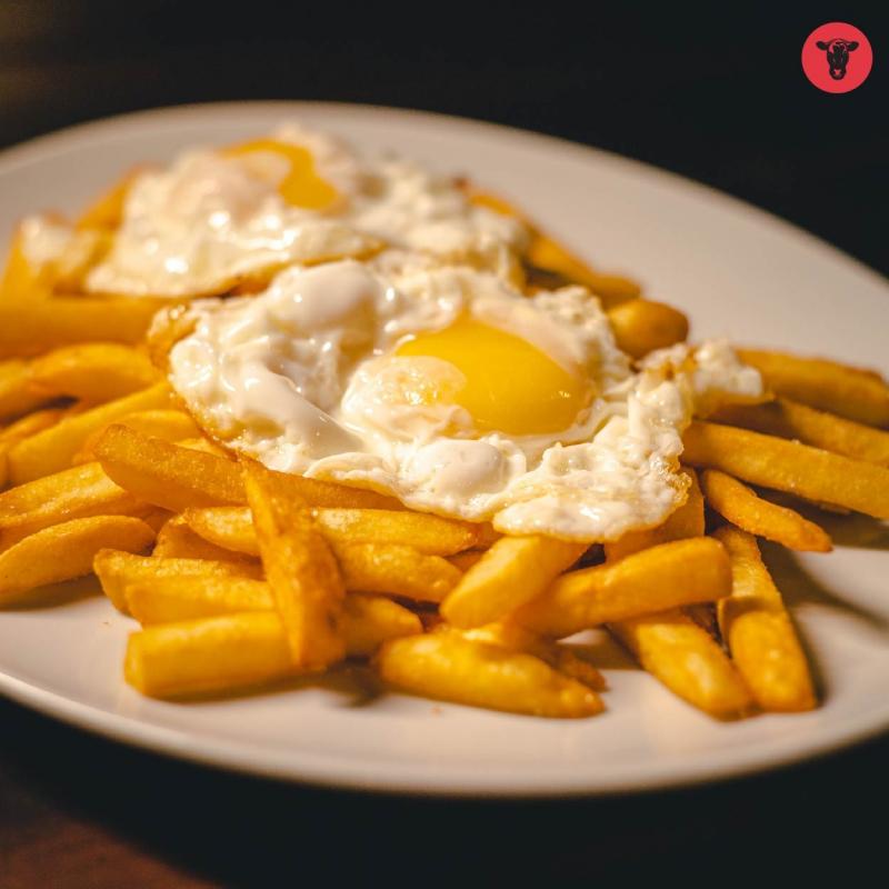 FRENCH FRIES WITH FRIED EGGS