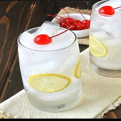 TOM COLLINS