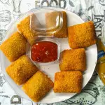 Almofadas de queijo gouda.