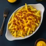 Batata frita com cheddar e bacon