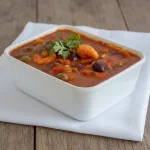 Filé de peixe ao molho de camarao