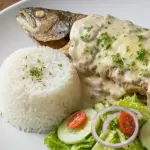 Trucha en salsa champiñones