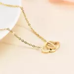 Cadena con corazon entrelazado Inox