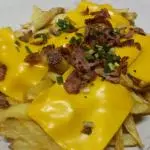 Porcion de papas gratinadas