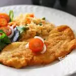 MILANESA DE POLLO CON GUARNICION
