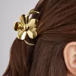 Pinza en forma de flor dorado