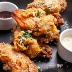 ALITAS  MANTEQUILLA AJO Y PARMESANO