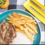 Chuleta  con papas fritas