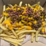 Porcion CheesePapas
