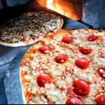 2 pizzas por 200