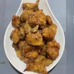Pollo con salsa naranja