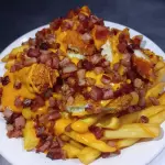 PAPA CON CHEDDAR ,BACON Y SUPREMITA