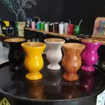 Cuia de madeira com pé