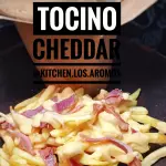Papas fritas tocino y salsa cheddar