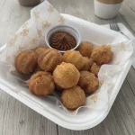 Mini churros com doce de leite