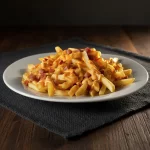 Batata frita com cheders e bacon gra