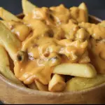 Papas con Cheddar y Panceta