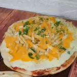 Papas cheddar (8 porc)