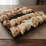 12 empanadas ( excep. Carne y pollo)