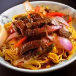 FETUCCINI A LA HUANCAINA SALT. CARNE