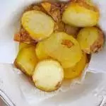 Porción de papas doradas