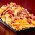 BATATA FRITA G + CHEEDAR + BACON