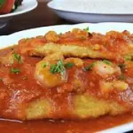 Filé de peixe ao molho de camarão