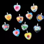 Dijes de corazón fluorescentes