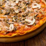 Pizza de Jamón y Champiñones
