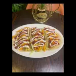 Servicio de tres tacos de pollo