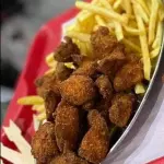 Porção de Frango Empanado c/ Fritas