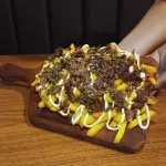 Porção de batata com Costela