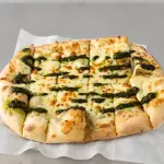 Palos de queso pesto