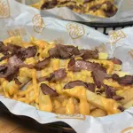 Papas con Queso y Tocineta