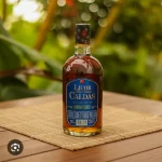 Botella ron caldas escencial