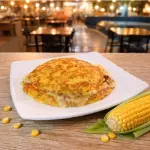 Arepa de choclo con carne desmechada