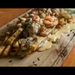 Saltado de pollo camarón