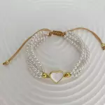 Pulsera tejida con perlas