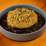 ESTOFADO DE CORDERO Y SOUFLÉ DE PAPA