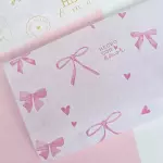 Papel encerado rosado moños RG119