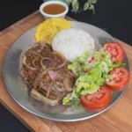 LOMO  DE CERDO EN BISTECK