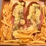 Milanesa a la napo + papas