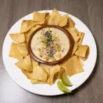 Queso fundido con champiñones