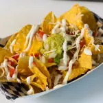 NACHOS CON CHEDDAR PREMIUM