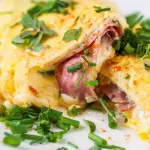 OMELETE C/PRESUNTO E QUEIJO