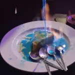 Pan de elote flameado en mezcal