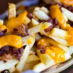Batata frita com cheddar/ bacon 150g