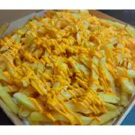 Media Porción de papas con Cheddar