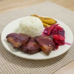 Medallones en salsa de vino y Corozo